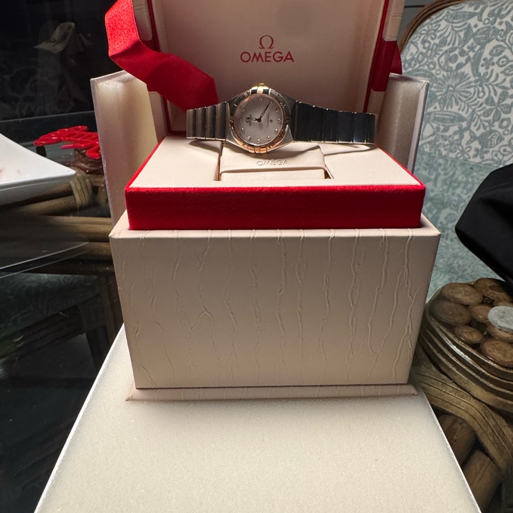 Omega Ladies/woman's Two-Tone Silver&Gold Watch w/12 twinkling Diamonds
Like NEW